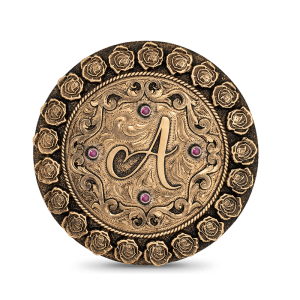 A custom initials belt buckle for women featuring a golden bronze base with roses and scrolls